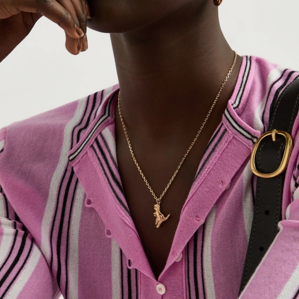 Elegant Gold COACH Dinosaur Pendant Necklace